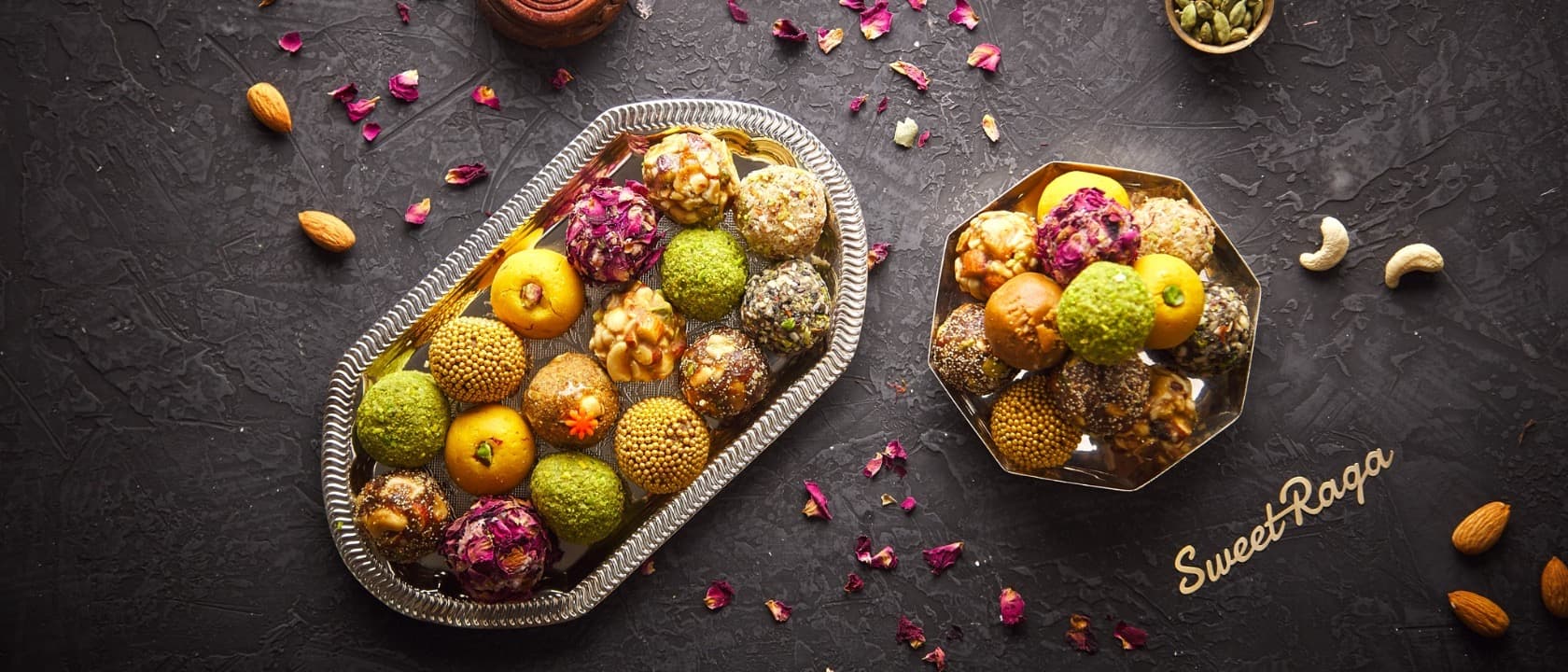 The Diwali table, lamps lit — wide